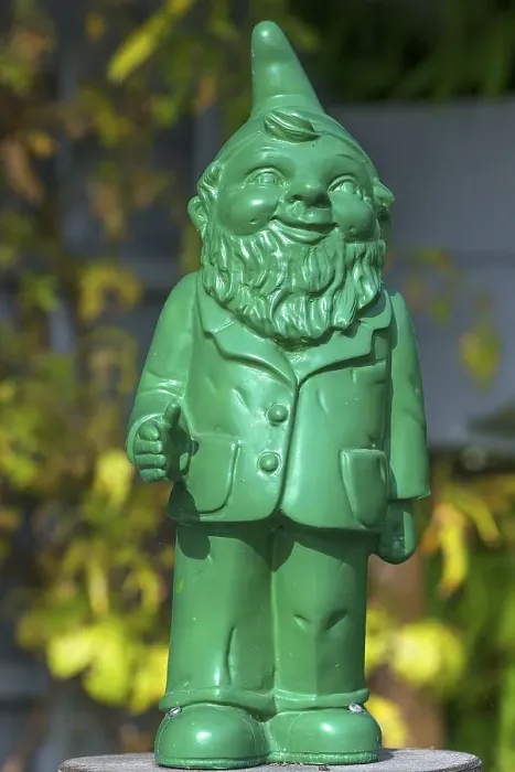 Framed Print : Green garden gnome designed by the artist Ottmar Horl