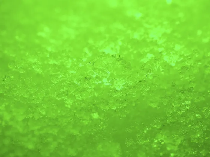 Framed Print : Green illuminated ice crystals as background