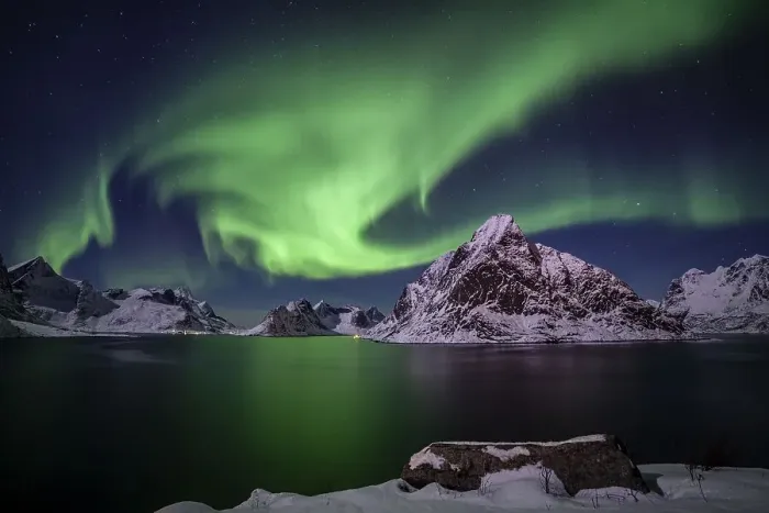 Framed Print : Green northern lights reflected in fjord