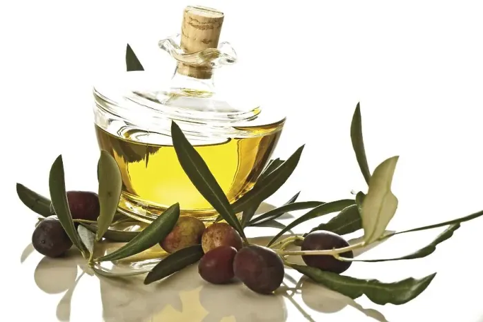 Framed Print : Green olives, olive leaves, olive oil bottle