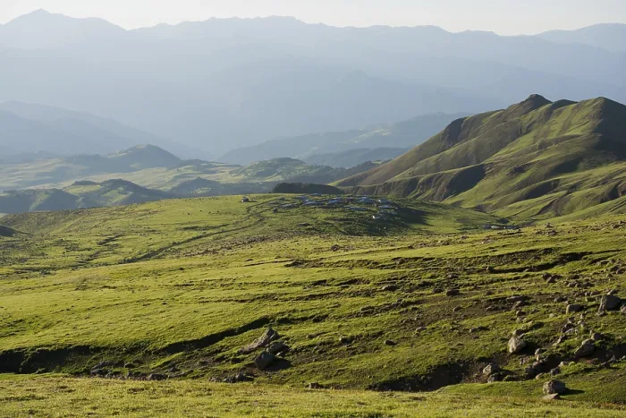 Framed Print : Green pasture in mountains during summer as nature background