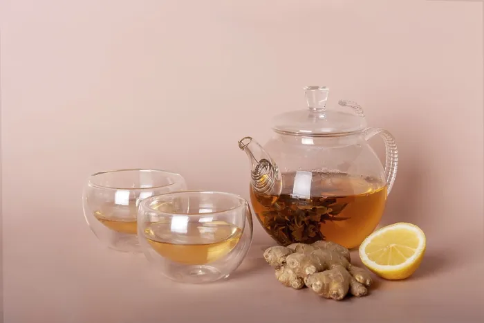 Framed Print : Green tea in a teapot, ginger root