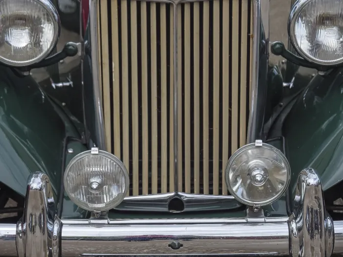 Framed Print : Green vintage car with striking vertical radiator grille and round headlights Framed Print : Green vintage car with striking vertical radiator grille and round headlights
