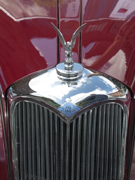 Framed Print : Grille with hood ornament of a classic Riley car