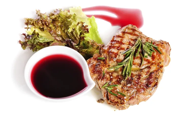 Framed Print : Grilled pork steaks with raspberry sauce
