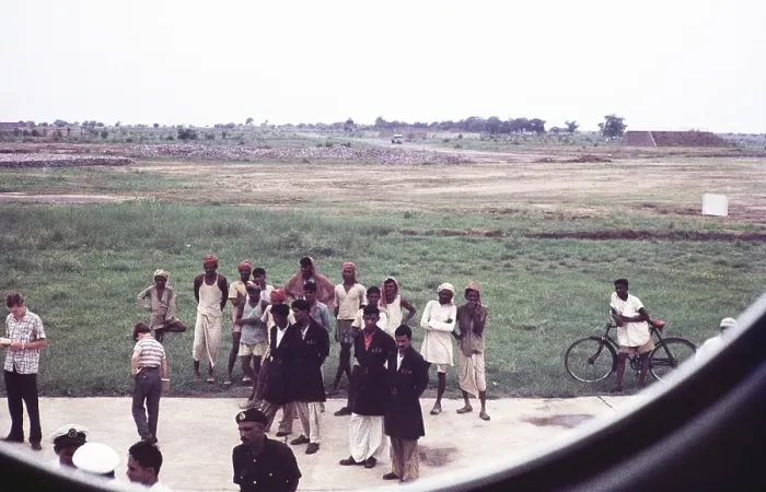 Framed Print : Ground staff and curious locals through the aeroplane window at Delhi airport, India, Asia, early 1960s, Asia