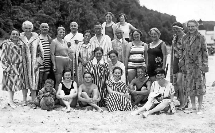 Framed Print : Group with bathers at the beach