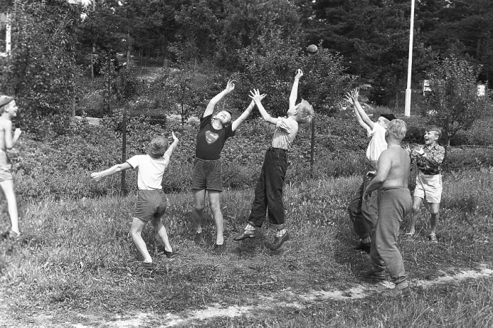 Framed Print : A group of boys playing outdoors, trying their best to reach the thrown ball first. 1954 Kristoffersson ref DV1