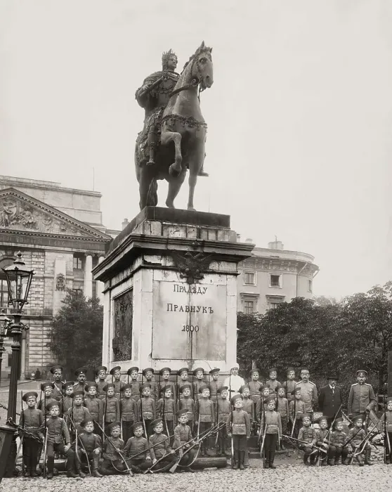Framed Print : A group of children soldiers before the Equestrian memorial to Peter the Great
