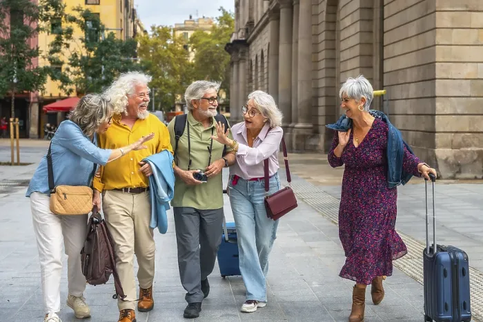 Framed Print : Group of happy senior friends enjoying a joyful trip