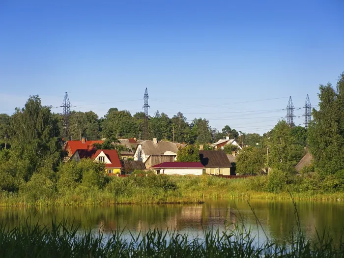 Framed Print : Group of houses in the forest near the river Framed Print : Group of houses in the forest near the river