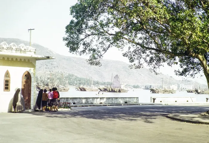 Framed Print : Group women and nuns at quayside with Chinese junks in harbour