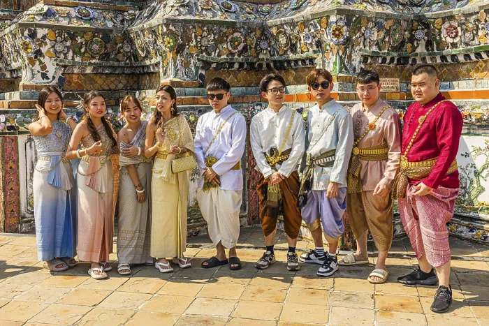 Framed Print : A group of young people wearing traditional clothing presents themselves for the photographers