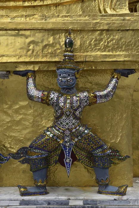 Framed Print : Guardian figure on a golden chedi