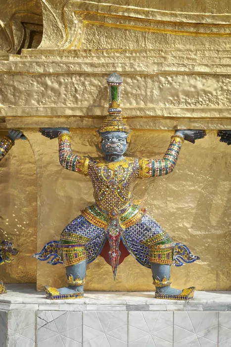 Framed Print : Guardian statue on the base of a golden chedi at Wat Phra Kaeo Framed Print : Guardian statue on the base of a golden chedi at Wat Phra Kaeo