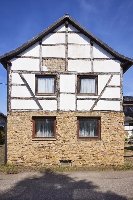 Framed Print : Half-timbered house on a sandstone plinth in the district of Pesch