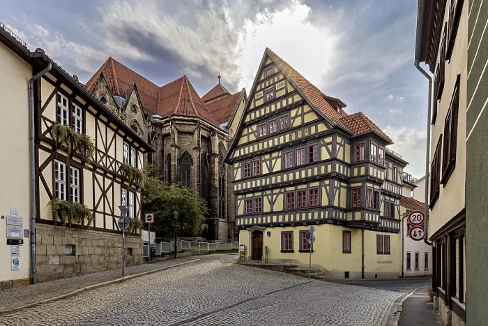 Framed Print : Half-timbered houses in a historic old town in sunshine and cobblestone streets