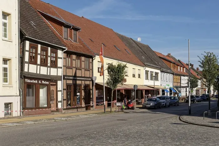 Framed Print : Half-timbered houses and shops in the cobbled Muehlenstrasse Am Markt in Seehausen Framed Print : Half-timbered houses and shops in the cobbled Muehlenstrasse Am Markt in Seehausen