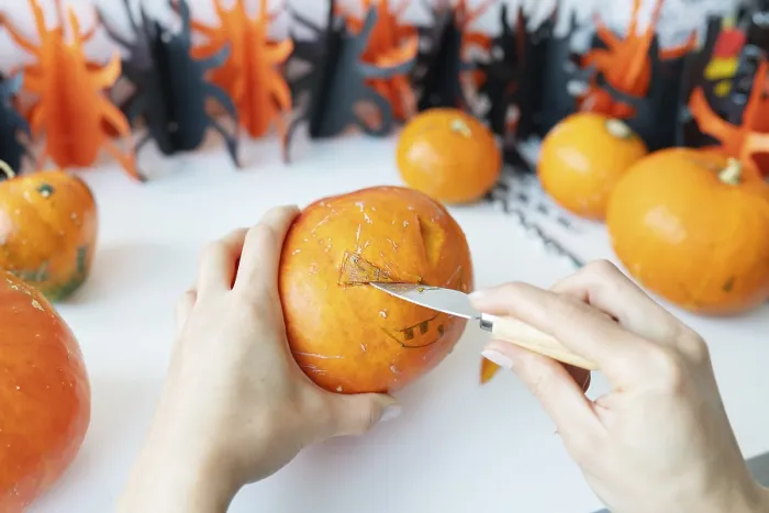 Framed Print : Halloween October 31st. The step-by-step process of carving a pumpkin
