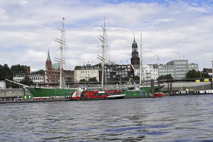 Framed Print : Hamburg harbour view with ships and clock tower by day
