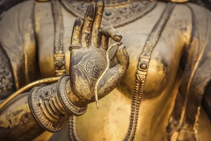 Framed Print : Hand of a statue, Buddhist deity