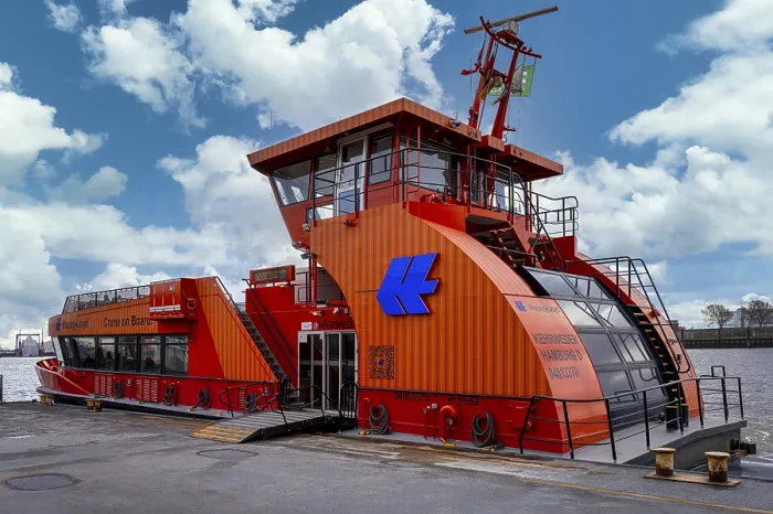 Framed Print : Hapag Lloyd ferry in orange, hvv ferry station at Dockland