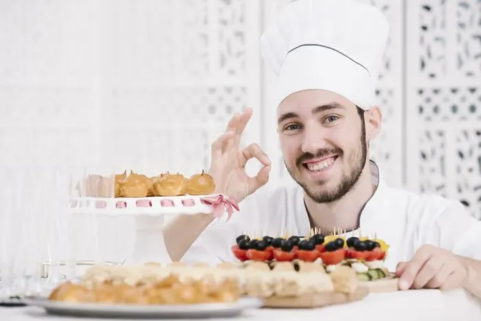 Framed Print : Happy chef presenting food table