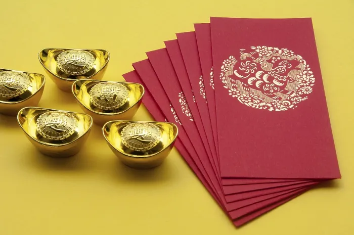 Framed Print : Happy Chinese New Year concept - Red packets with Chinese Golden Ingots