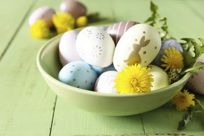 Framed Print : Happy Easter Holidays. Handmade Easter colorful eggs and spring flowers dandelions on a rustic wooden table