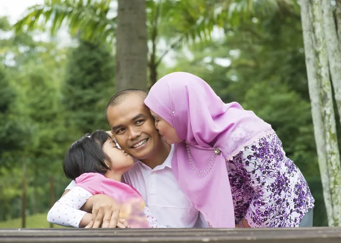 Framed Print : Happy Southeast Asian Muslim family Framed Print : Happy Southeast Asian Muslim family