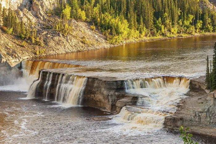 Framed Print : The Hay River cascades over layers of sedimentary rocks at Louise Falls