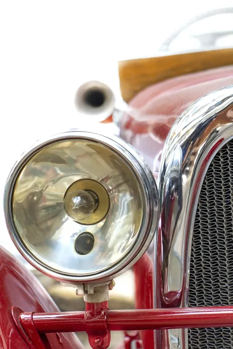 Framed Print : The headlight of the old car. Veteran car with large chrome light