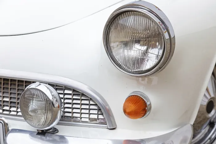 Framed Print : Headlights and indicators of a German sports car from the sixties Framed Print : Headlights and indicators of a German sports car from the sixties