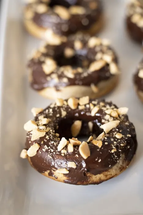 Framed Print : Healthy gluten-free donuts covered in chocolate and almonds