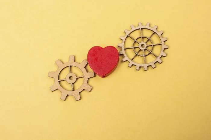 Framed Print : Heart shaped icon and Wooden cogwheels as love concepts