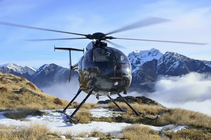 Framed Print : Helicopter waiting for hunters in South Westland's Southern Alps