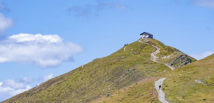 Framed Print : Helmhaus mountain hut on a mountain peak