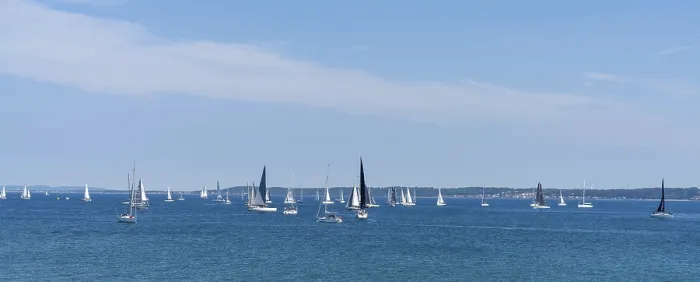 Framed Print : Helsingor, Denmark - 17 June 2021: panorama view of many sailboats sailing on a calm blue ocean