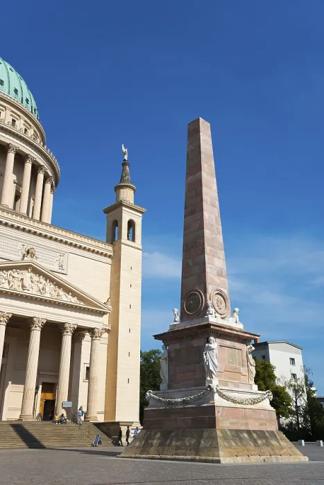 Framed Print : High obelisk next to an architectural masterpiece with dome Framed Print : High obelisk next to an architectural masterpiece with dome