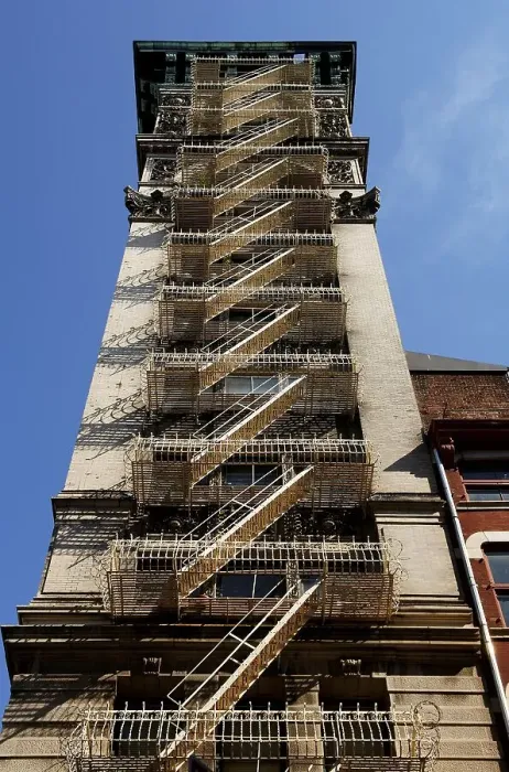 Framed Print : High rise with fire escape ladders