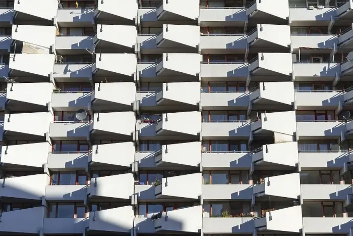 Framed Print : High-rise residential building with balconies and satellite dishes