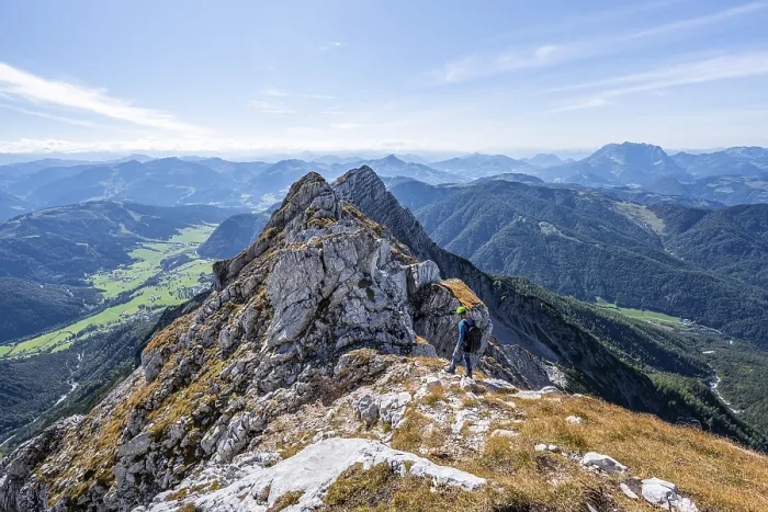 Framed Print : Hiker with climbing helmet, on hiking trail at a ridge Framed Print : Hiker with climbing helmet, on hiking trail at a ridge