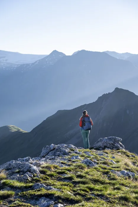 Framed Print : Hiker enjoying the mountain panorama in the morning