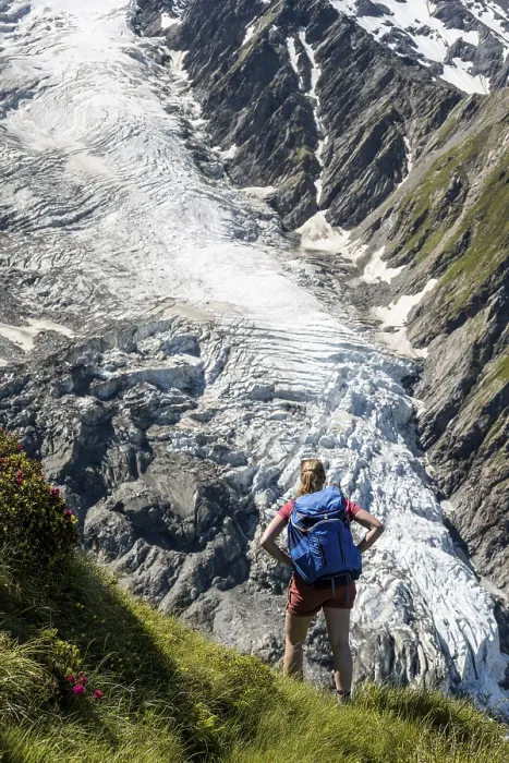 Framed Print : Hiker in front of glacier, hiking trail La Jonction