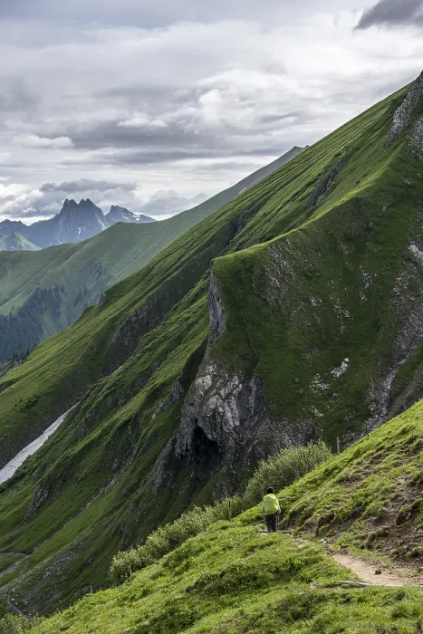 Framed Print : Hiker on a hiking trail, descending from the Rappenseehuette