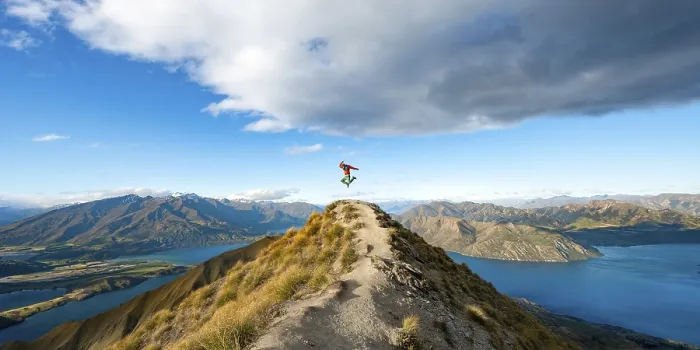 Framed Print : Hiker takes a skydive, views of mountains and lake from Mount Roy
