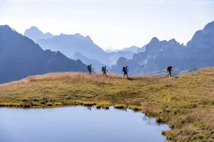 Framed Print : Four hikers on the Carnic High Trail