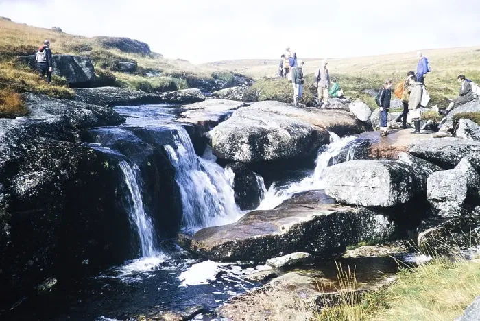 Framed Print : Hikers at the waterfall of the East Dart River, Dartmoor National Park, Devon, England, UK 1973
