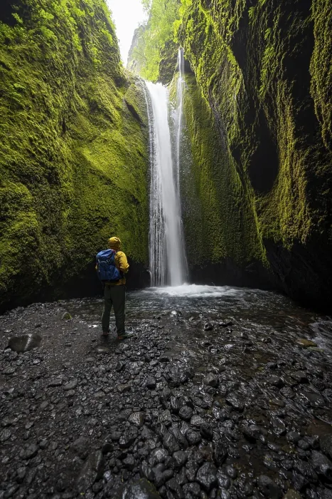 Framed Print : Hikers in front of waterfall, river in Nauthusagil Gorge