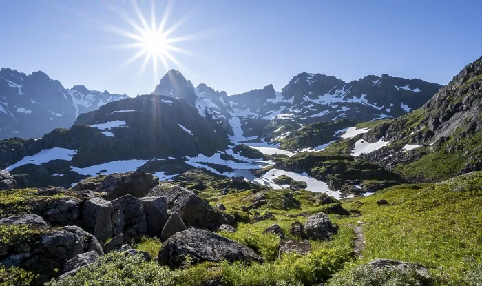Framed Print : Hiking trail, sun shining on mountains with snow